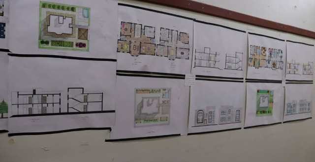 تسليم الأعمال النهائية في مادة الرسم لطلبة الهندسة المعمارية بجامعة المعرفة